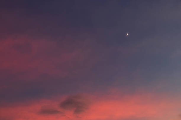 istock Crescent moon on beautiful sunset sky background. 1440048328
