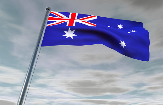 Australian Flag on a Cloudy Sky