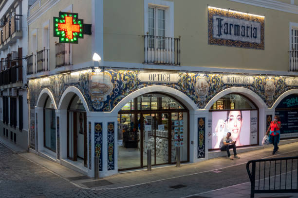 Zafra's 'Farmacia Buzo' is the most beautiful pharmacy in Spain after winning a national competition. The establishment stands out for its tiled facade. Zafra, Badajoz, Spain - October 30, 2022: Zafra's 'Farmacia Buzo' is the most beautiful pharmacy in Spain after winning a national competition. The establishment stands out for its tiled facade. farmacia stock pictures, royalty-free photos & images