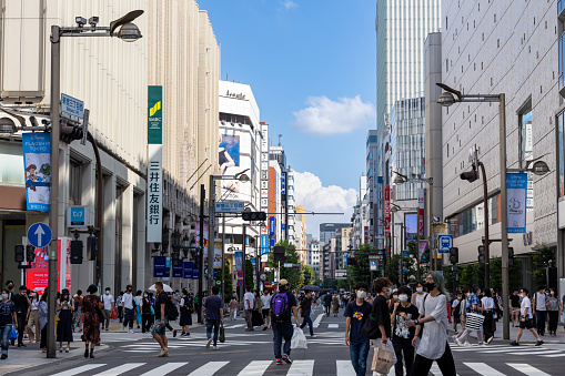 Tokyo, Japan - September 4, 2022 : People at Shinjuku’s Pedestrian Paradise in Tokyo, Japan. Shinjuku 3-chome becomes a pedestrian paradise during every Sunday and holidays.