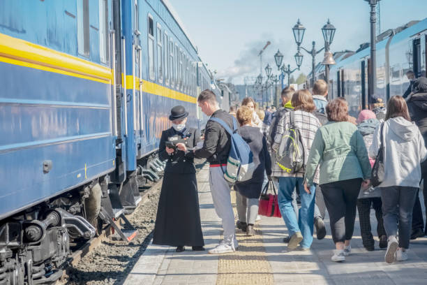 Passengers on a platform between two trains stock photo