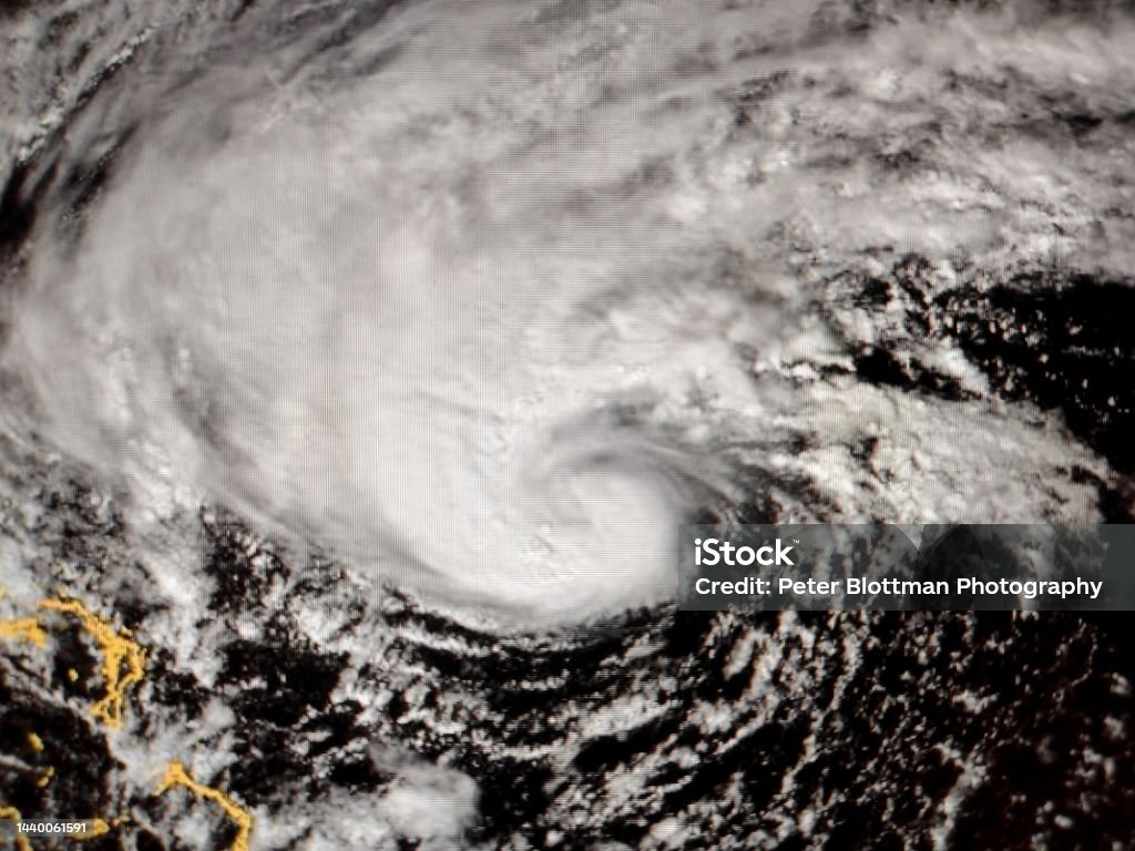Tropical storm Nicole organizes itself east of the Bahamas and Florida Tropical storm Nicole organizes itself east of the Bahamas and Florida. Developing tropical storm Nicole transitions from being subtropical to fully tropical as deep convection forms near the center of the circulation shown in satellite image November 8, 2022. Abstract Stock Photo