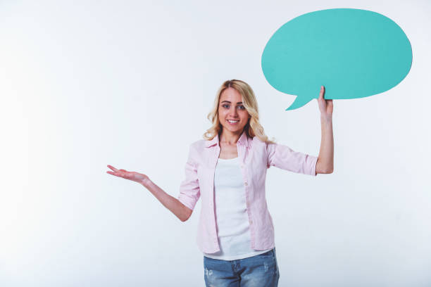 istock Girl with speech bubble 1440063915
