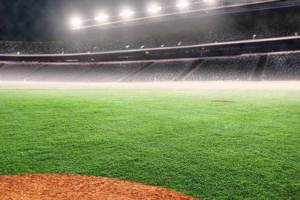 Baseball Diamond on Field in Outdoor Stadium With Copy Space Baseball diamond on field at brightly lit outdoor stadium. Focus on foreground and shallow depth of field on background and copy space. home plate stock pictures, royalty-free photos & images
