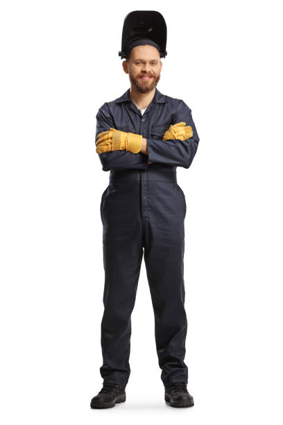 istock Welder in a uniform with a helmet posing 1440066274