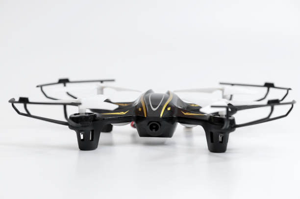 istock Air drone on a white background. Front view quadcopter with digital camera. Flying aerial drone with remote control. 1440066668