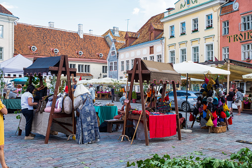 07/06/2022 Estonia Riga city square. Old City Festival trade in the city market, people in historical costumes.