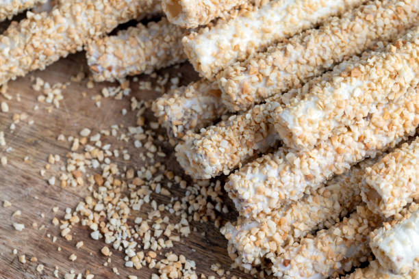 istock waffle tube with chocolate filling and crushed peanuts 1440070832