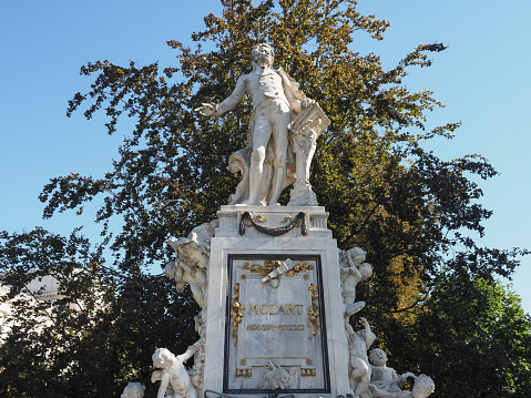 Vienna, Austria - Circa September 2022: Mozart Denkmal translation Mozart monument in Burggarten by architect Karl Koenig and sculptor Viktor Tilgner circa 1896