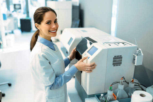 istock female science intern analyzing DNA, RNA or blood samples for drug use results, disease and virus research looking at camera 1440081195