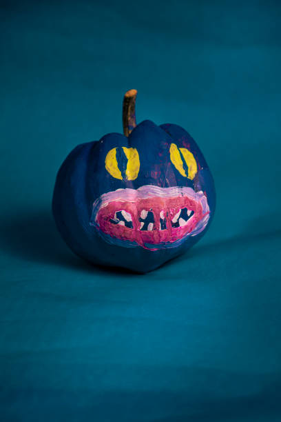 istock Halloween pumpkin on the blue background 1440083848