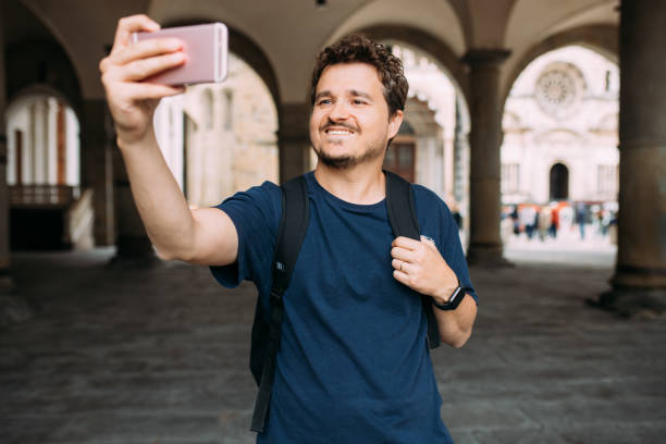 istock Man taking selfie with his smartphone 1440085018
