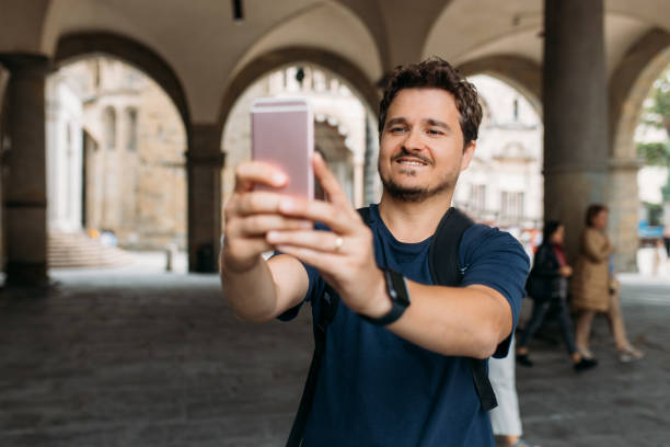 istock Man taking selfie with his smartphone 1440085121