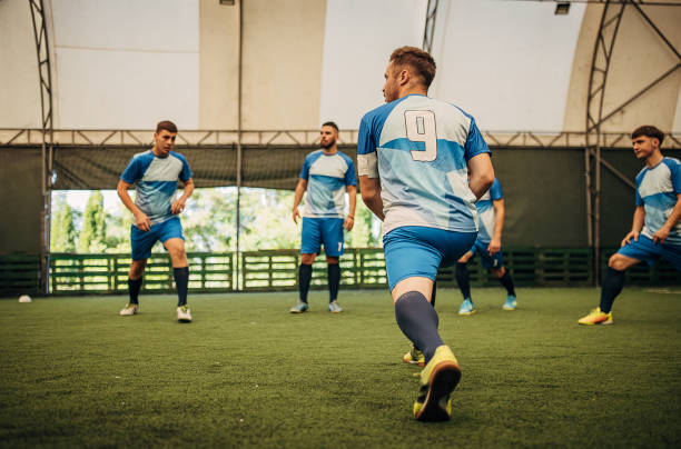 istock Soccer players training together 1440085310