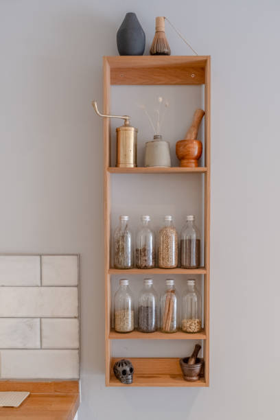istock Wooden Shelf with Spices in the Kitchen 1440085392
