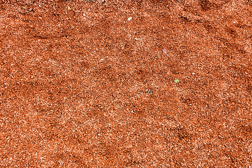 Red color gravel flooring