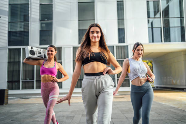 istock Group of women dancing modern dance 1440090567