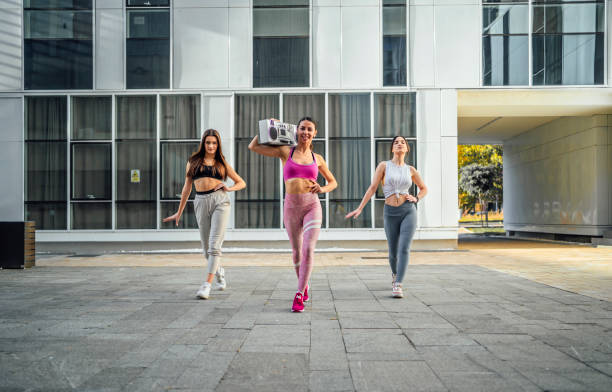 istock Group of women dancing modern dance 1440090592