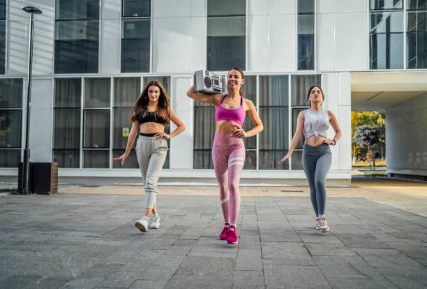 istock Group of women dancing modern dance 1440090619