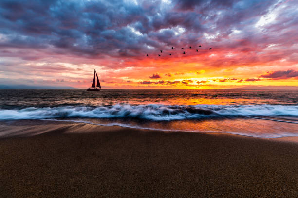 istock Sunset Ocean Sailboat Beach Inspirational Nature Sunrise High Resolution 1440094357