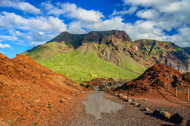 Mountains near Punto Teno Lighthouse in north-west coast of Tene Mountains near Punto Teno Lighthouse in north-west coast of Tenerife, Canarian Islands punto stock pictures, royalty-free photos & images