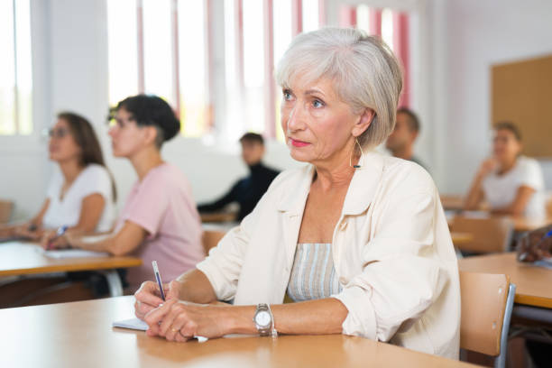 istock Senior woman attending foreign language course 1440098875