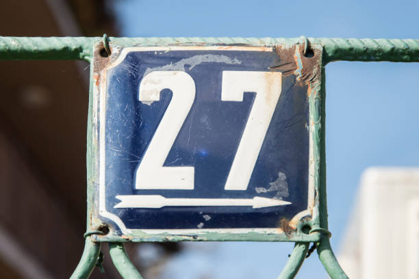 istock Weathered enameled plate number 27 1440102778