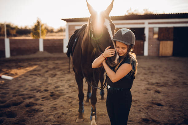 istock A girl hugs her horse 1440103001