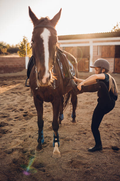 istock A girl in a riding school 1440103793