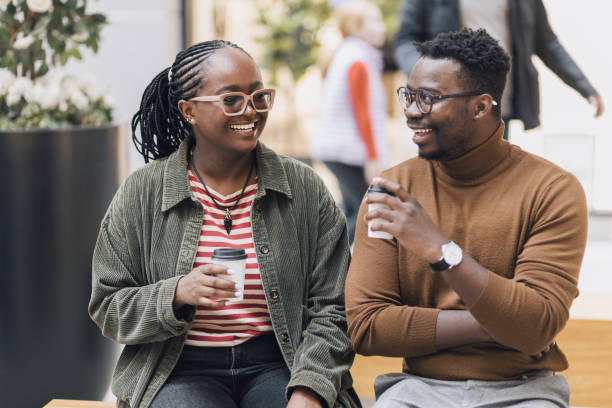 Black brother and sister spending some quality time together stock photo