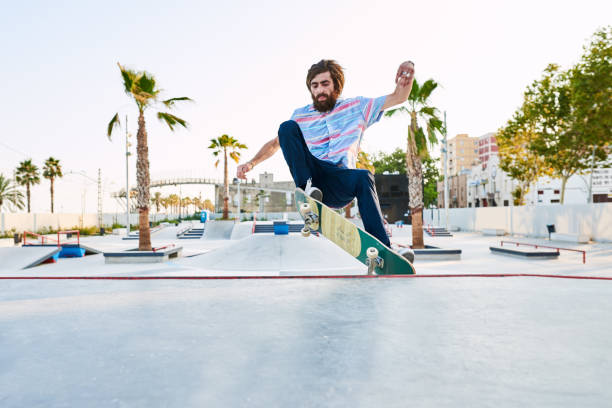 istock Skater performing trick in skate park 1440105053