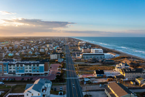 istock Aerial View over Highway 12 in the Outer Banks Looking Towards Kill Devil Hills in North Carolina 1440109793
