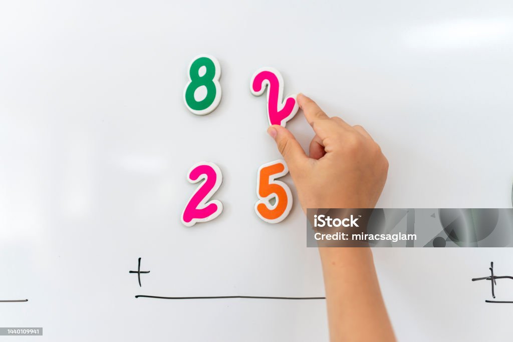 Math Problem Magnetic Primary School Student In Uniform Solving Math Problem With Magnetic ...