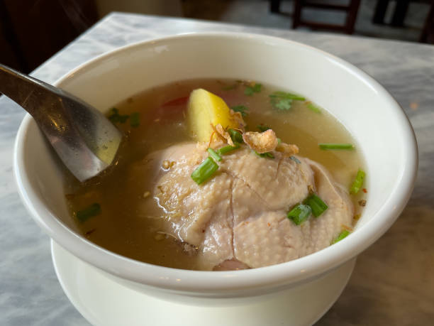 istock Hot chicken soup is served on the table. 1440111179