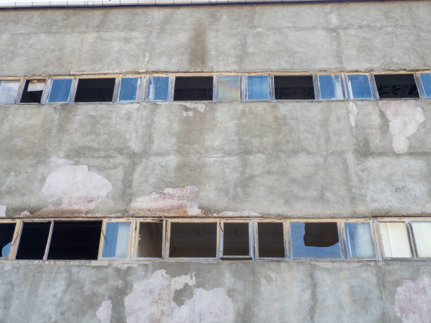 istock Old abandoned industrial building. Broken windows. 1440111197