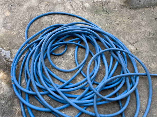 istock The soft hose lay cluttered on the ground. 1440111200