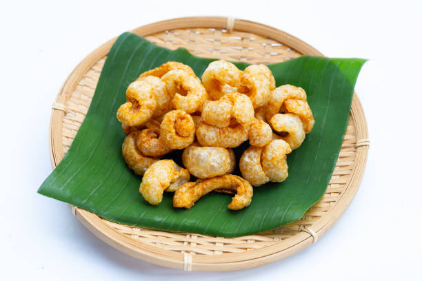 istock Crispy pork rinds or pork snack. 1440118717