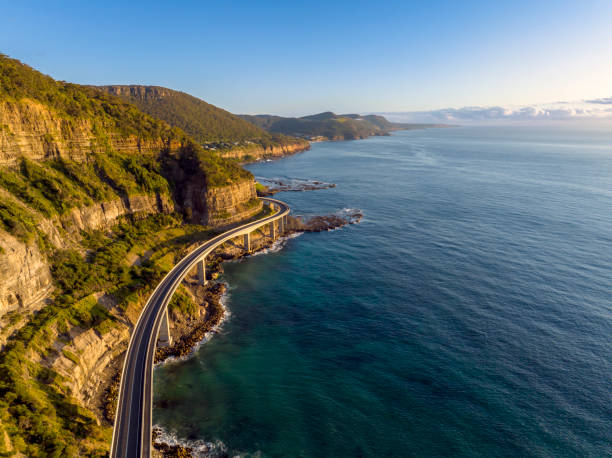 sea cliff bridge - australia new south wales aerial view landscape stock-fotos und bilder