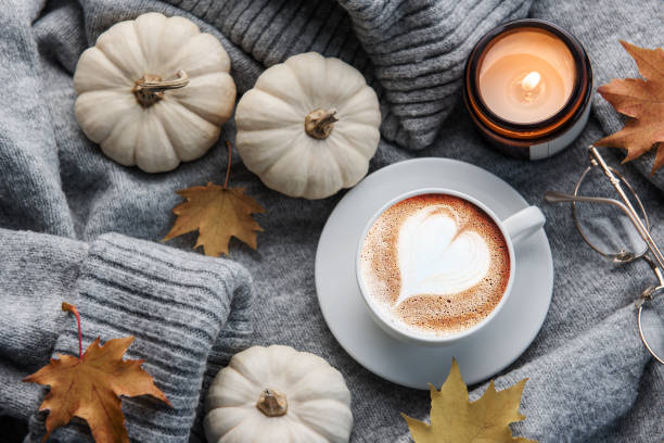 istock White pumpkins, coffee and autumn leaves 1440126290