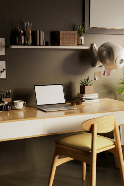 istock Living room interior with working space and laptop on working table with office supplies 1440132457