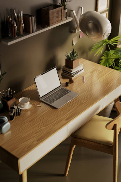 istock Study room interior with working space and laptop on working table with office supplies. 1440132458
