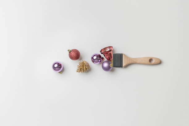 istock creative christmas concept with brush and decorative balls flat lay 1440133332