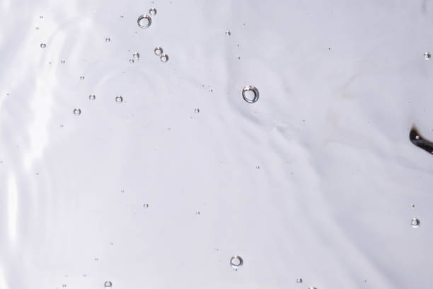 istock Underwater bubble texture on white background. Water with bubbles. Air bubbles underwater 1440135039