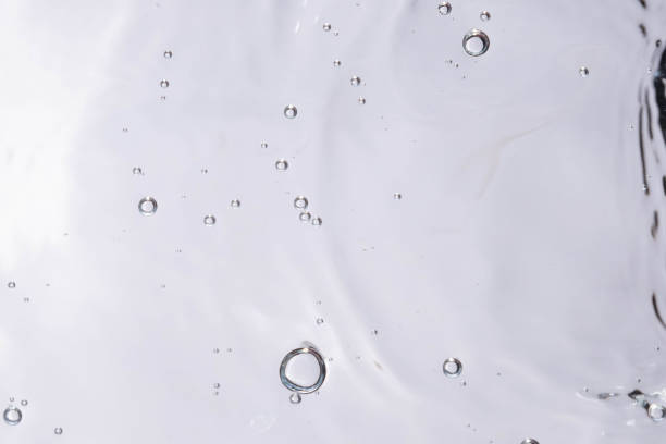 istock Underwater bubble texture on white background. Water with bubbles. Air bubbles underwater 1440135041