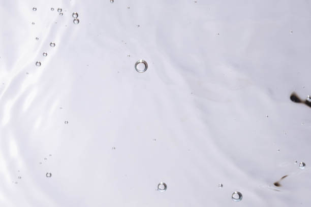 istock Underwater bubble texture on white background. Water with bubbles. Air bubbles underwater 1440135048