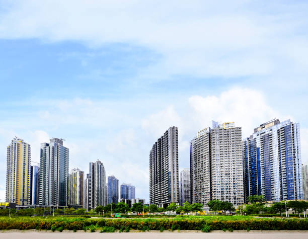 panorama budynków mieszkalnych w kai tak, hong kong - clear sky hong kong island hong kong china zdjęcia i obrazy z banku zdjęć