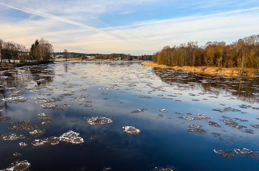 The ice floes on the river in winter.  A view from the bridge.
