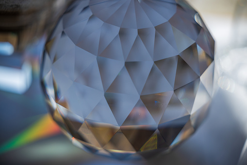 Faceted glass sphere in sunlight