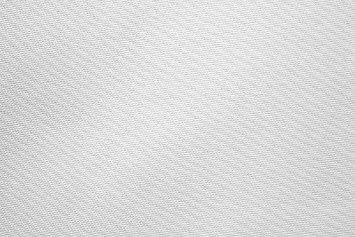 Close up of white clean canvas, seamless pattern backdrop