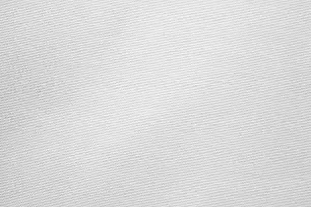 Photo of Close up of white clean canvas, seamless pattern